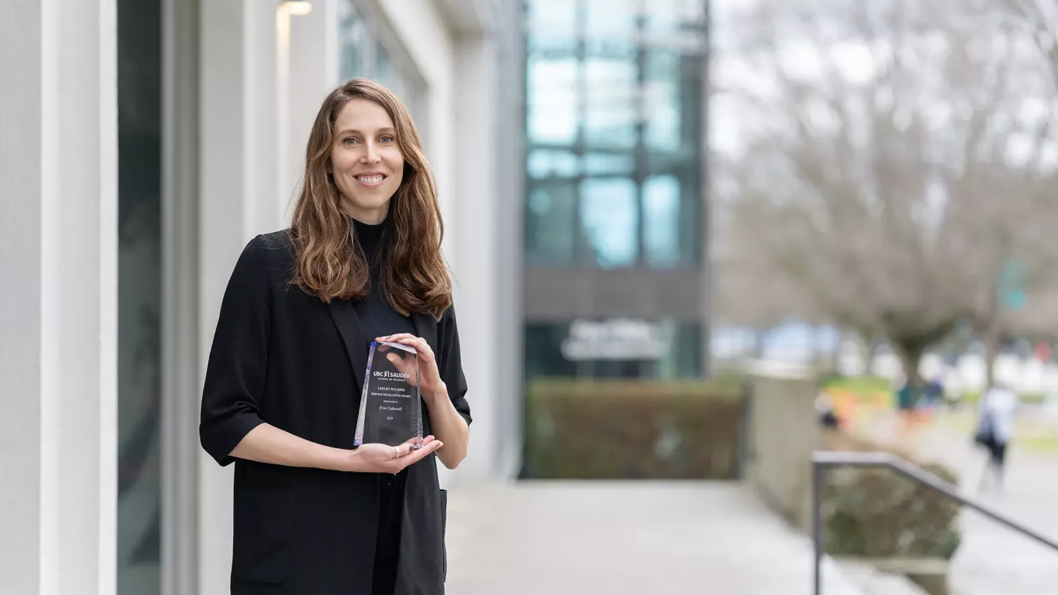 Person holding award