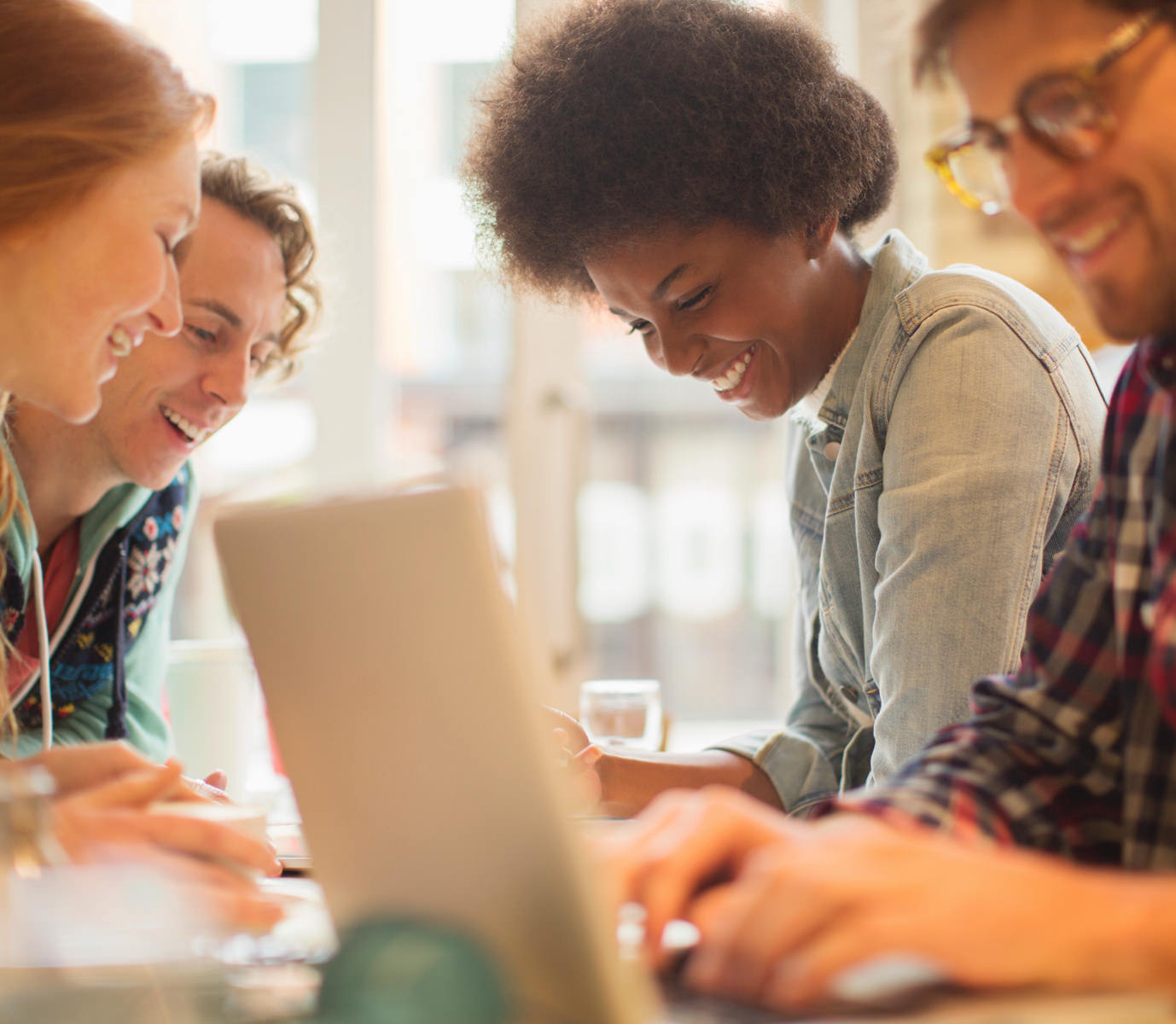 Team working on laptops